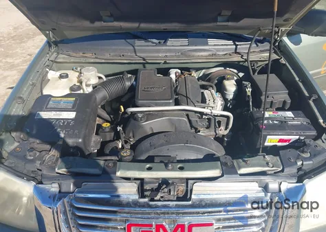 2003 GMC Envoy Sle z USA, uszkodzony, nr VIN 1GKDT13SX32319317